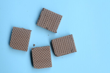 cocholate wafers with a blue background
