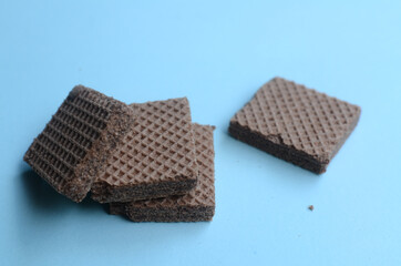 cocholate wafers with a blue background
