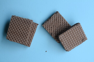 cocholate wafers with a blue background
