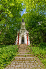 Fototapeta na wymiar Laska' s Chapel - The director of the local theatre Julius Laska had this chapel built in 1909 in memory of his mother. It is a narrow building in the neo-Gothic style - Marianske Lazne (Marienbad)