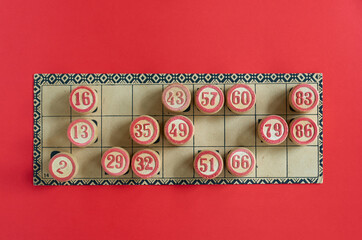Tabletop old lotto game with wooden elements. Cards bingo