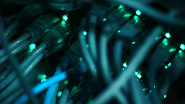 Working Ethernet switch close up. Blinking LED. 10/100/1000 Mpbs speed. Fully loaded and working fast. Top technology clip.