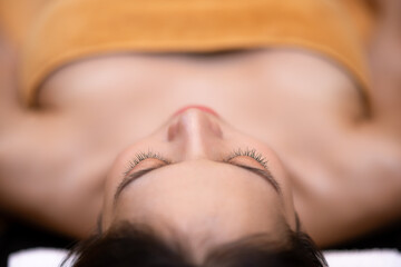 Naklejka premium Beautiful Young Asian Woman in spa salon