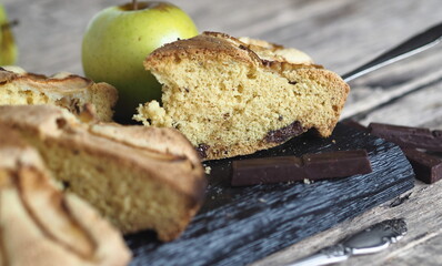 Homemade Apple pie on a rustic wooden background. A classic dessert made of dough for any holiday.
