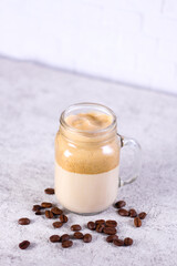 Dalgona Coffee on a glass with dried coffee