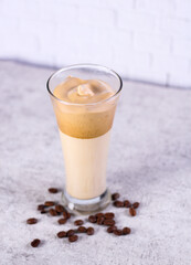 Dalgona Coffee on a glass isolated white background