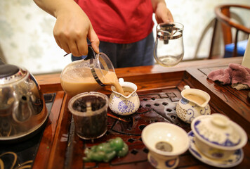 Brewing Chinese tea from the tea leaves.