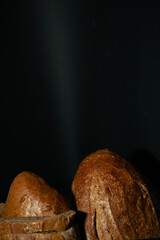 Rye or wheat dark bread with leaven or yeast with a golden crust