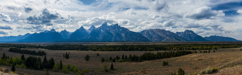 Fototapeta premium Grand Tetons on a partly cloudy afternoon
