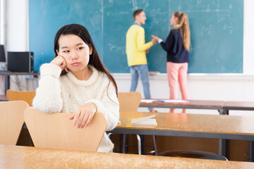 Frustrated Asian in class