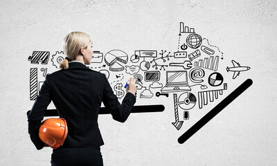 Businesswoman draws various business infographics