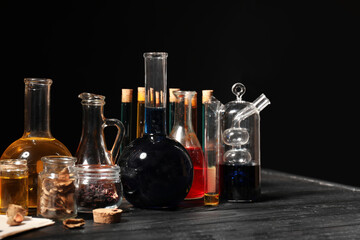 Obraz na płótnie Canvas Different potions on alchemist's table