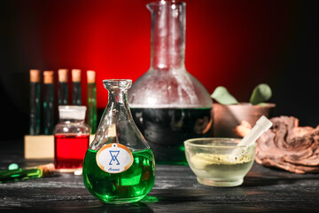 Different potions on alchemist's table