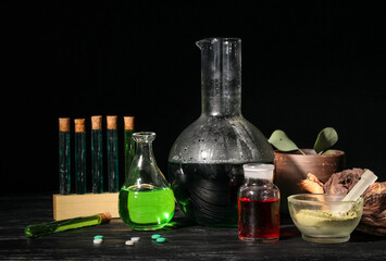 Different potions on alchemist's table