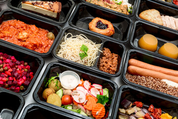 Healthy food and diet concept, restaurant dish delivery. Take away of fitness meal. Weight loss nutrition in foil boxes.