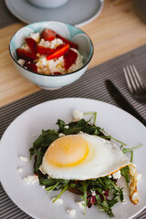 toast with fried egg and coffee for breakfast.