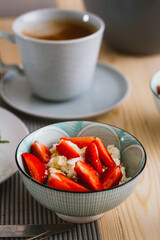 cottage cheese with strawberries and coffee.
