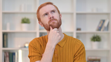 Fototapeta na wymiar Portrait of Redhead Man Thinking and Getting Idea