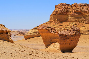 Alien like desert rock formations in wadi al hitan, whale valley unesco world heritage site in...