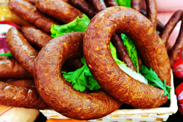 Smoked sausage in the form of a ring on the counter