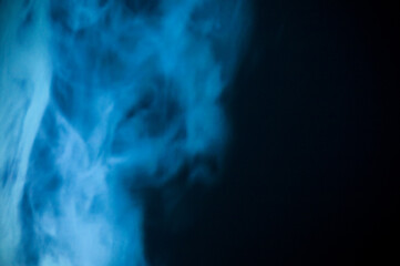 blue smoke background in the dark