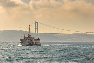 Fototapeta premium Tourists boat cruise in the Bosphorus strait, Istanbul, Turkey.