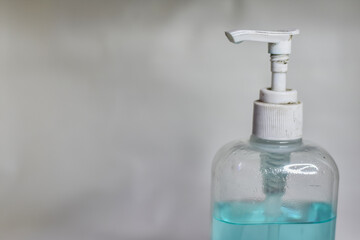 Fototapeta na wymiar white hand sanitizer bottle on a white blur background, Hand Sanitizer 
