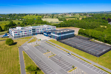 Aerial drone photo of the Whitcliffe Mount Primary School, showing an aerial photo of the British school building on a bright sunny summers day