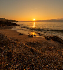 The coast of Oropesa from the sea at sunrise