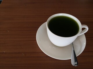 a cup of hot green tea