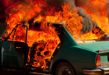 Exploded parking car on fire