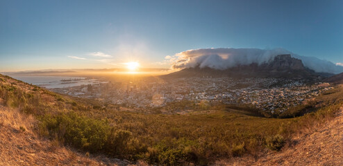 Sunrise in Cape town - capital of South Africa.Table mountain. view from above. harbor in the city....