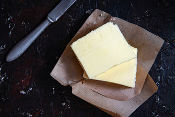 Fresh farm butter on parchment. Homemade butter