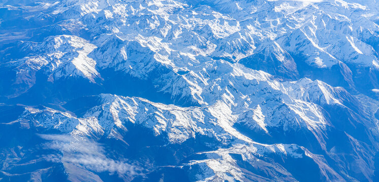 Flight over the snow capped mountains of the Pyrenees