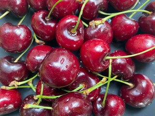 Top view cherry in plate, closeup