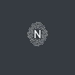 Hand drawn vector floral frame with "N" letter. Elegant floral monogram for "N".