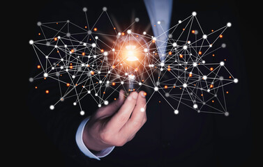 Business man holding light bulbs, ideas of new ideas with innovative technology and creativity  and Connection technology concept