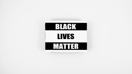 Black Lives Matter text on lightbox on white background. Black Lives Matter protest 