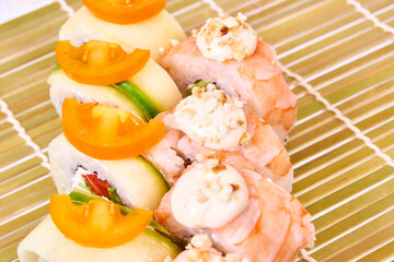 Set of Sushi rolls on bamboo mat