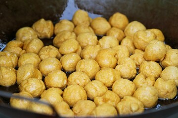Close up pile of Fried meatballs thai street food market