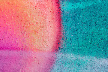 Beautiful bright colorful street art graffiti background. Abstract creative spray drawing fashion colors on the walls of the city. Urban Culture, violet , pink , purple , crimson, blue texture
