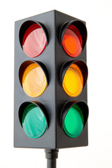 Traffic lights - toy isolated on white background: