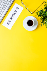 Job search. Yellow office desk form above space for text. Hiring concept