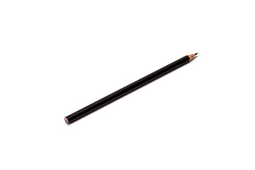 A black pencil lies diagonally on an isolated white background. Isolate.