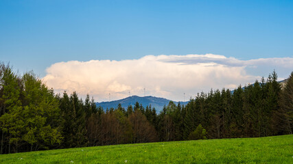 Fototapeta na wymiar Germany, Thunderstorm clouds and dramatic sky weather forming over endless black forest nature landscape