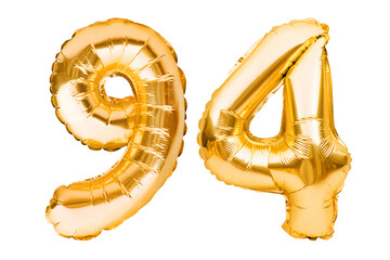 Number 94 ninety four made of golden inflatable balloons isolated on white. Helium balloons, gold...