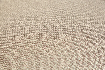 A close up of brown fabric pattern
