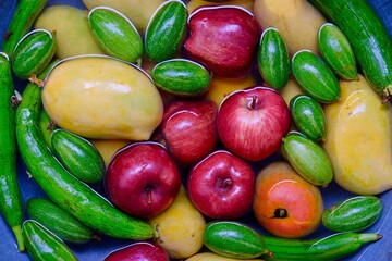 Fruits and vegetables soaked in water for cleaning, sanitize