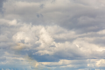 Thunderclouds on a gray sky. Beautiful background