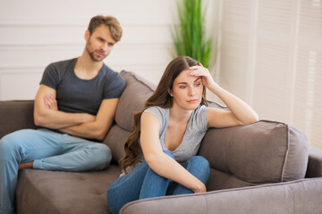 Obraz premium Young woman sit looking offended after a bad talk with her husband